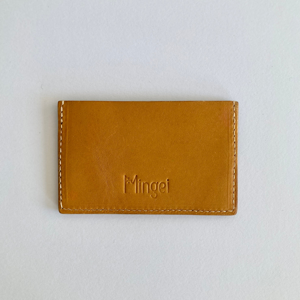Porte-cartes Estran safran et kaki, dos avec le logo Mingei embossé