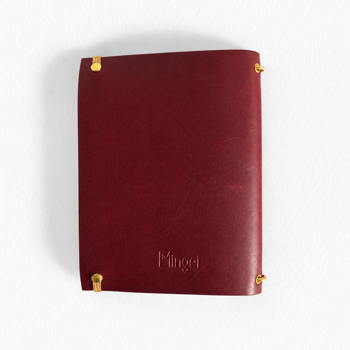 Carnet Armérie en cuir prune, de dos